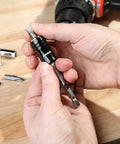 2 In 1 Socket Bit Holder For One Quarter Inch Drive Sockets And Bits With Quick Change Mechanism in hand on wooden surface