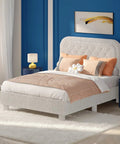 White Queen Boucle Upholstered Platform Bed With Rounded Headboard Sturdy Wood Slats Plush Cloud Back Cushioning in modern room.
