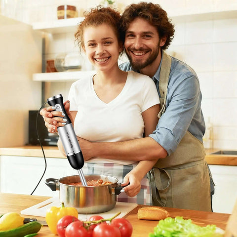 Heavy Duty Handheld Immersion Blender Featuring A Badass 1100 Watt Motor And Zero Fuss Variable Speed Control For Perfect Pureeing Ice Crushing And Whisking Tasks While Keeping Life Smooth in a cozy kitchen setting.