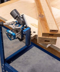 MortiseMate Loose Tenon Jig For Woodworking Easy Mortise Cutter with auto indexing installed on workbench with wood pieces
