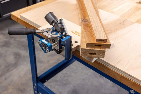 MortiseMate Loose Tenon Jig For Woodworking Easy Mortise Cutter with auto indexing installed on workbench with wood pieces