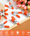 Beefy 24 Pack 4 Inch Metal Spring Clamps With 1.5 Inch Jaw Opening Orange Skid Resistant Clips in a crafting setting