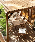 Eight Piece 45 Degree Pergola Bracket Set For 2x4 Lumber Heavy Duty Angle Supports With Drainage Holes installed on wooden patio