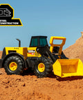 Steel Front Loader Toy Truck For Kids Ages 3 And Up, Built Tough With A Steel Frame And Sturdy Plastic, on dirt terrain