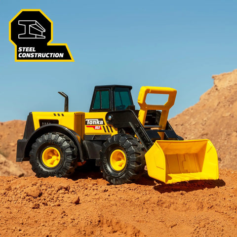 Steel Front Loader Toy Truck For Kids Ages 3 And Up, Built Tough With A Steel Frame And Sturdy Plastic, on dirt terrain