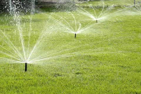 High Efficiency Pro Rotary Sprinkler With Built In Regulator Delivers Constant 30 PSI in operation on green lawn