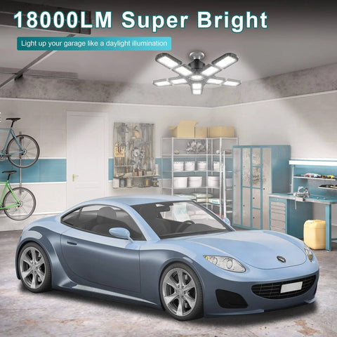 Garage with Crazy Bright 180W LED Garage Light With 10 Plus 1 Foldable Panels Delivering 36,000 Lumens illuminating a car