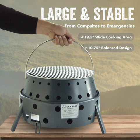 Hand holding 2nd Gen Collapsible Grill And Stove Portable Camping Cooker For Charcoal Or Wood, showcasing wide cooking surface.