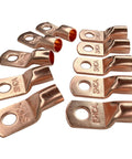 Pack Of Ten 1/0 Gauge Copper Ring Terminal Connectors With Red Black Heat Shrink Tubing 3/8 Inch Stud For Heavy Duty Car Audio Power Wiring That Will Keep Your Bass Rig Amped Up Daily, showing copper connectors arranged on white background.