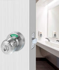 Privacy Door Knob Lock With Large Indicator Window, Thumb Turn, ANSI Grade 2, shown on bathroom door with green Vacant display