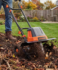 18 Inch Electric Garden Tiller With 9 Inch Tilling Depth, A Workhorse 15 Amp Corded Cultivator in use on soil