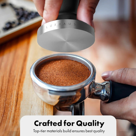 53mm Calibrated Coffee Tamper With Spring Loaded 100 Percent Flat Stainless Steel Base For Espresso Machines in use.