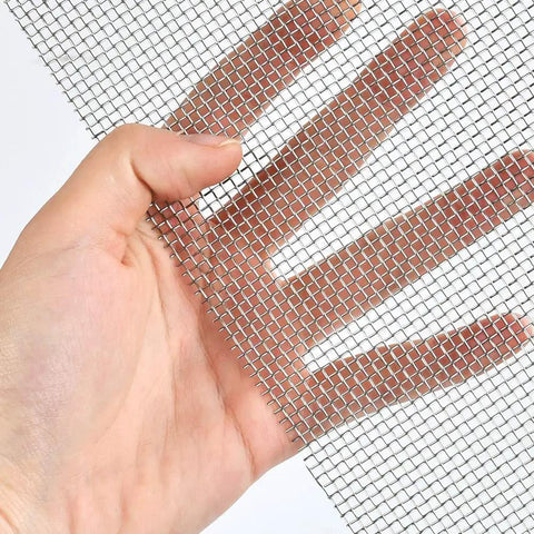 Close-up of hand holding Stainless Steel Woven Wire Mesh 10 Mesh 12 By 8 Inch 3 Pack Built To Last No Rust With 1.98mm Openings And 0.6mm Wire Diameter