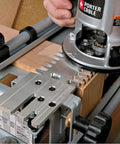 Person using DIY Router Template Kit For Mini Through Dovetail And Box Joints With 4200 Series Jig Compatibility on wood.