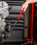 Mechanic using Dual Head Extendable Breaker Bar With 3/8 And 1/2 Inch Drive, Red Handle, 16 To 24 Inch Telescoping Length