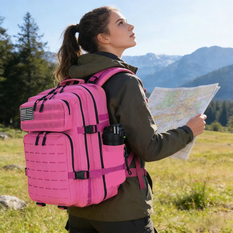 Woman hiking with Beefy Military Tactical Backpack 45L 25L With MOLLE Daypack, map in hand, hydration setup, outdoor mountains