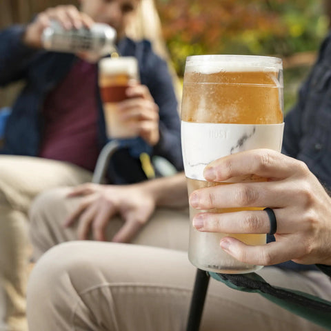 Freezable Insulated Pint Mugs Set Of 2 Double Walled Frosty Drink Glasses With Gel Core keeps beer icy longer during outdoor gathering.