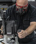 Man using a router machine wearing Dust Mask With Replaceable Twin HEPA Filters For Woodworking And Construction, Half Face Pro Grade Mask, All Day Comfort, Low Exhalation Valve, Glasses Friendly, Medium Large Fit