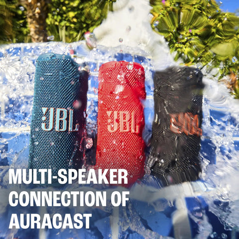 Grip Compact Bluetooth Speaker With Bold Pro Sound, pink, red, and blue speakers in water showing Auracast connection
