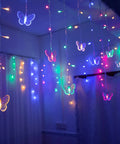 Butterfly Curtain Lights 13ft 96 LED Fairy String With Remote 8 Modes Multicolor Vibe hanging in a colorful room setup