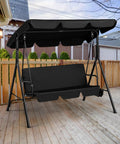 3-Seat Patio Swing Chair With Adjustable Canopy And Removable Cushions Outdoor Cozy Glider Lounge For Patio Garden Yard Porch Weatherproof Frame Sturdy Steel Construction Black on a wooden deck