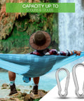 Man in hammock by waterfall with Heavy Duty 316 Stainless Steel Carabiners 3 Inch Spring Snap Hooks for gym and outdoor use
