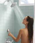Person using Spectra Plus ETouch 4 Function Shower Head With Wall Remote, Easy Touch Pattern Switch, 2.5 GPM in shower