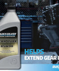 Container of Quicksilver 85W90 Extreme Performance Gear Lube for outboard and sterndrive racing in a workshop setting.