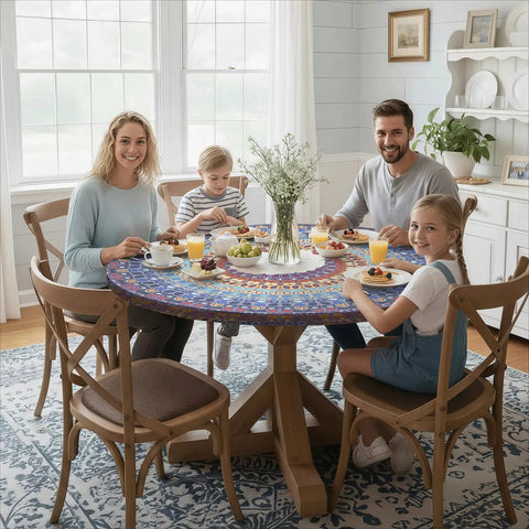 Family dining with Boho Vinyl fitted round tablecloth for 45 to 54 inch tables in a cozy indoor setting.