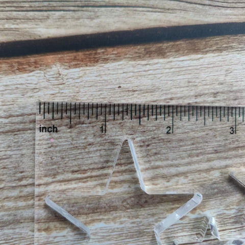 Close-up of Bowtie Router Template Kit for Woodworking with star inlay, one quarter inch thick acrylic, on wood surface