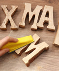 Hand sanding wooden letters with 110 Piece Sandpaper Variety Pack Wet Dry Grit 80 To 3000 For Wood Furniture Crafts and Metal Projects