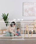 Super Wide Configurable Baby Gate For Doorways And Open Spaces Three Panel Wall Mounted Safety Gate With Door For Babies Toddlers And Pets Expands From 28 To 76 Inches Includes Wall Mount Hardware demonstrating room separation