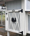White barn door with 8 Inch Heavy Duty Decorative T Strap Hinge Rustproof Iron Black Gate Hinge installed, 270-degree swing view.