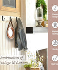 Heavy Duty Kickass Cast Iron Wall Hooks 5 Pack Handmade Blacksmith J Hooks hanging jackets and mirror on wall indoors.