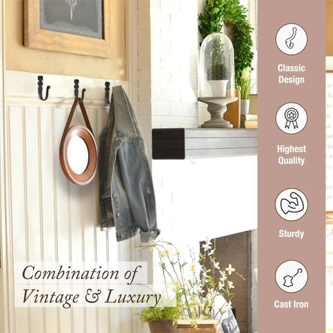 Heavy Duty Kickass Cast Iron Wall Hooks 5 Pack Handmade Blacksmith J Hooks hanging jackets and mirror on wall indoors.