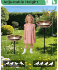 Durable Metal Bird Bath With Stake, 10 Inch Diameter Bowl, 0.4 Gallon Capacity in garden with child, showing adjustable height.