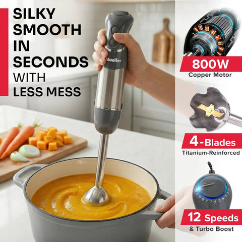 Person using Boss 5 In 1 Immersion Hand Blender Set With 800W Copper Motor And Titanium Reinforced Blades to blend soup in kitchen.