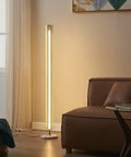 Callie LED Floor Lamp 55 Inch Tall Industrial Style with Metal Grid Shade next to a brown sofa in a living room setup