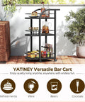 Black Three Tier Rolling Bar Cart Featuring Sturdy Safety Rails And Smooth Swivel Casters Crafted To Hold Your Goodies in outdoor setting with drinks.
