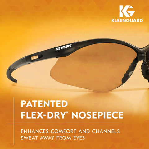Close-up of Nemesis Indoor Outdoor Safety Glasses With Black Frame showing patented flex-dry nosepiece on orange background.