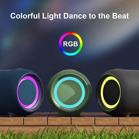 Three portable Bluetooth speakers with RGB lights featuring 40W peak power, deep bass, and water resistance on a wooden surface.
