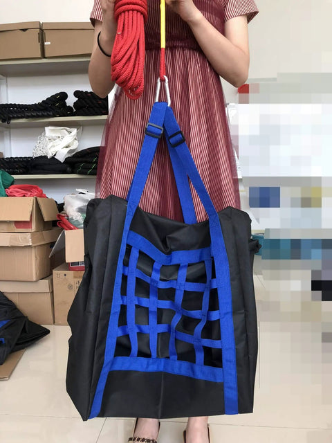 Pet Fire Escape Bag For Dogs And Cats Up To 55 Pounds With 50 Foot Rescue Rope Emergency Survival Kit displayed by person