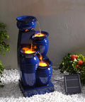 4 Tier Cascading Solar Powered Water Fountain with Navy Finish Illuminated by LED Lights outdoor garden water feature