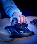 Hand using TWCS Throttle For Flight Sim PC USB Controller With Low Profile Design For Precise Smooth Aircraft Control And Immersive Virtual Cockpit Experience Today Pro Grade Gear on desk