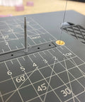 Close-up of Hot Wire Foam Cutter Table with Variable Temperature showing angle measurements and cutting wire setup.