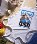 The Office Inspired Kevin's Famous Chili Cook-Off Fan Favorite Apron With Pockets And Adjustable Neck Strap 100 Percent White Cotton