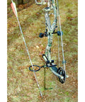 Must Have Portable Archer Ground Stake with 360 Degree Rotating Fork and arrow ring in outdoor setting