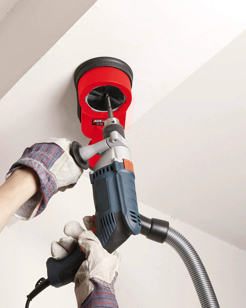 Using rotary hammer dust collection attachment with universal dust shroud for drilling, easy dust busting for concrete and masonry
