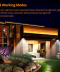 Outdoor Solar Flood Lights 48 LED Cordless Waterproof With Motion Sensor Adjustable Vertical 120 Degrees And Horizontal 180 Degrees Angles Security Lighting For Deck Fence Patio Front Door Yard Shed Path 4 Pack No Fuss Setup illuminating a modern patio.
