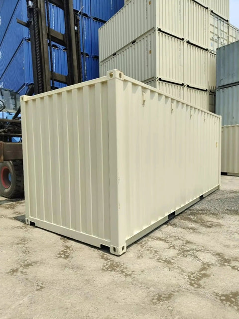 Custom Built Walk In Cold Storage Container With A Badass Commercial Refrigeration Setup And Clean Stainless Steel Interior For Rock Solid Frozen Inventory Holding, beige exterior in storage yard.